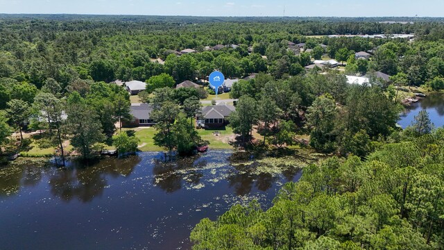 554 Magnolia Lake Dr, Defuniak Springs, FL 32433 - drone / aerial view of a heavily wooded area and a nearby body of water