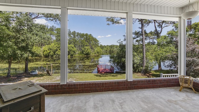 554 Magnolia Lake Dr, Defuniak Springs, FL 32433 - sunroom / solarium featuring a water view and view of wooded area