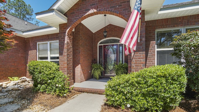554 Magnolia Lake Dr, Defuniak Springs, FL 32433 - property entrance with brick siding and covered porch