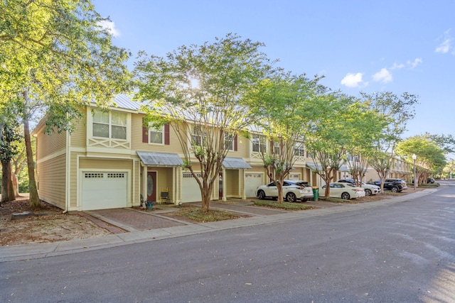387 Twin Lakes Ln, Destin, FL 32541 - view of property with an attached garage and driveway