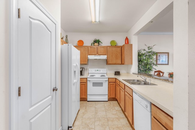 387 Twin Lakes Ln, Destin, FL 32541 - kitchen featuring white appliances, a sink, under cabinet range hood, and light countertops