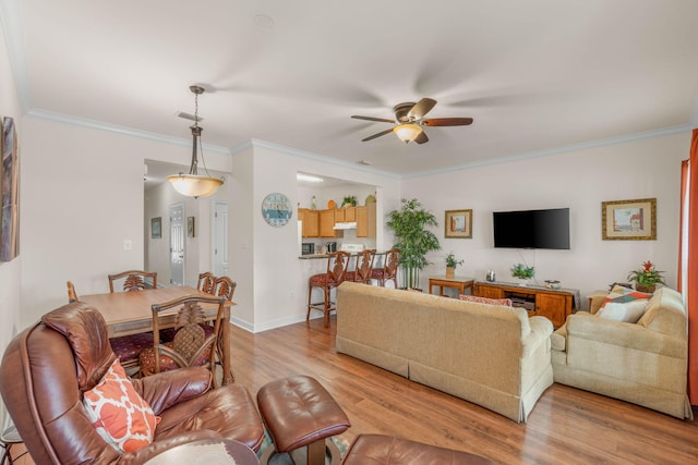 387 Twin Lakes Ln, Destin, FL 32541 - living area featuring ceiling fan, light wood-type flooring, and crown molding