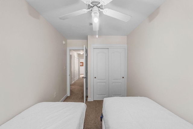 387 Twin Lakes Ln, Destin, FL 32541 - carpeted bedroom with a closet and a ceiling fan