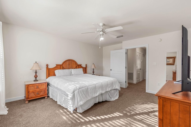387 Twin Lakes Ln, Destin, FL 32541 - bedroom with light carpet, baseboards, and ceiling fan