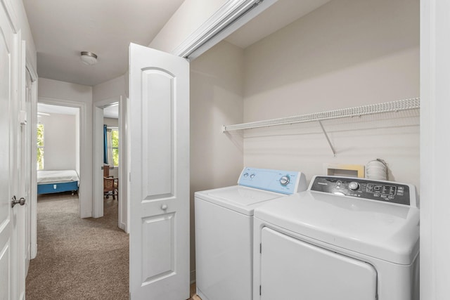 387 Twin Lakes Ln, Destin, FL 32541 - laundry area featuring separate washer and dryer and carpet