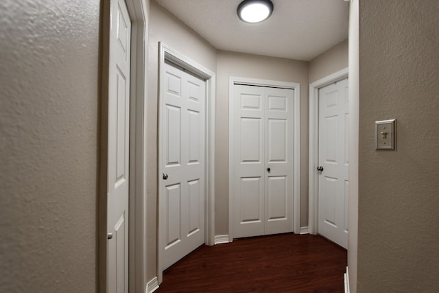 206 Secretariat Dr, Crestview, FL 32539 - hall with a textured wall and dark wood-type flooring