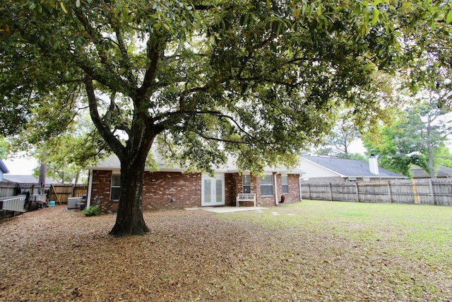 206 Secretariat Dr, Crestview, FL 32539 - view of yard with french doors and a fenced backyard