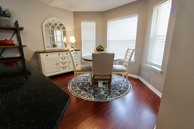 206 Secretariat Dr, Crestview, FL 32539 - dining room featuring baseboards and dark wood finished floors