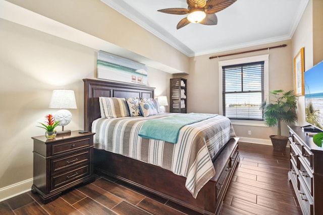 bedroom with dark wood-style floors, ornamental molding, baseboards, and a ceiling fan