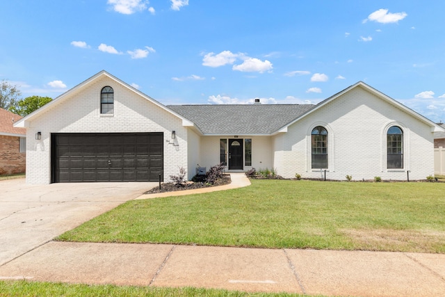 197 Kel-Wen Circle Kel-Wen, Destin, FL 32541 - ranch-style home featuring brick siding, a front lawn, and driveway