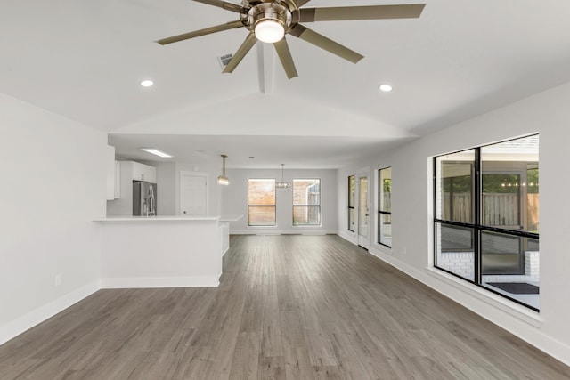 197 Kel-Wen Circle Kel-Wen, Destin, FL 32541 - unfurnished living room with ceiling fan, wood finished floors, baseboards, and recessed lighting