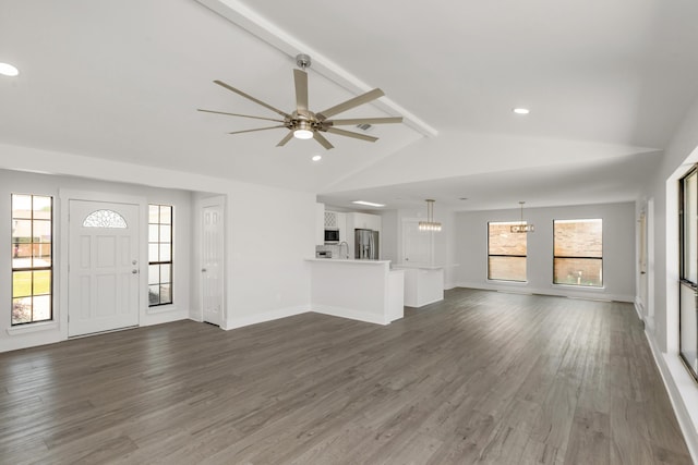 197 Kel-Wen Circle Kel-Wen, Destin, FL 32541 - unfurnished living room with a ceiling fan, dark wood-style floors, a chandelier, recessed lighting, and baseboards