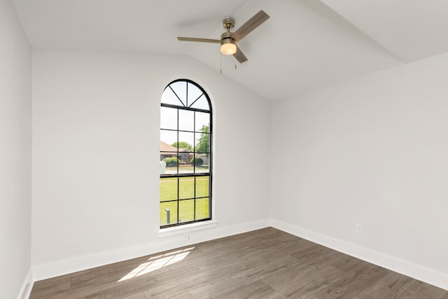 197 Kel-Wen Circle Kel-Wen, Destin, FL 32541 - unfurnished room with vaulted ceiling, wood finished floors, a ceiling fan, and baseboards
