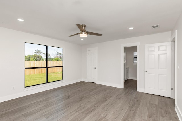 197 Kel-Wen Circle Kel-Wen, Destin, FL 32541 - spare room featuring a ceiling fan, baseboards, wood finished floors, and recessed lighting