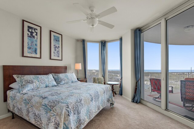 4203 Indian Bayou Trl Unit 1716, Destin, FL 32541 - bedroom featuring carpet, access to outside, baseboards, and ceiling fan