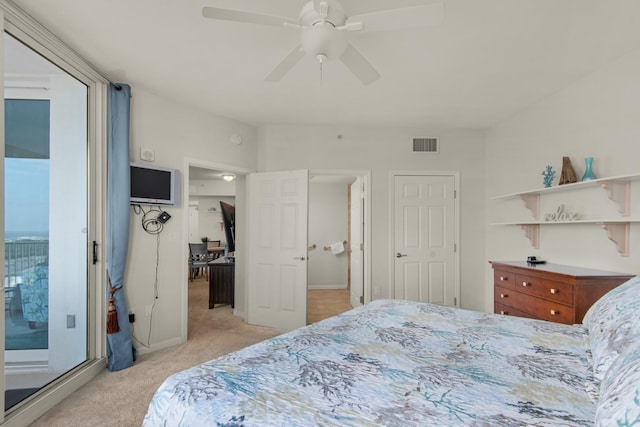 4203 Indian Bayou Trl Unit 1716, Destin, FL 32541 - bedroom with light colored carpet, ceiling fan, and visible vents