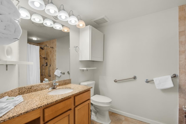 4203 Indian Bayou Trl Unit 1716, Destin, FL 32541 - bathroom featuring a tile shower, vanity, visible vents, toilet, and tile patterned floors