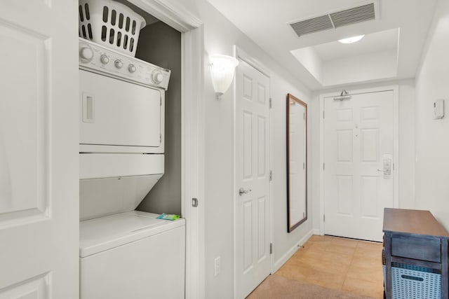 4203 Indian Bayou Trl Unit 1716, Destin, FL 32541 - clothes washing area featuring stacked washer / dryer, laundry area, and visible vents