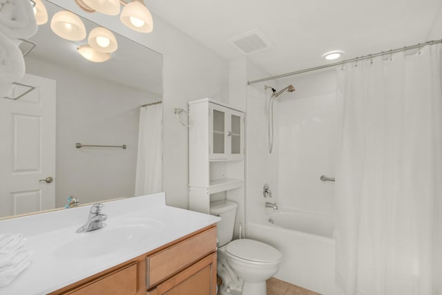 4203 Indian Bayou Trl Unit 1716, Destin, FL 32541 - full bath featuring visible vents, toilet, shower / tub combo with curtain, vanity, and tile patterned flooring