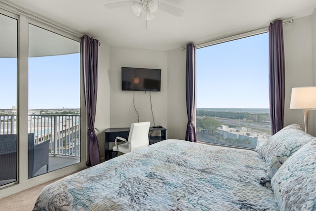 4203 Indian Bayou Trl Unit 1716, Destin, FL 32541 - bedroom with access to outside, carpet flooring, and a ceiling fan