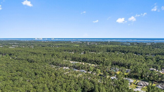 7045 Leisure St, Navarre, FL 32566 - aerial view of property and surrounding area featuring a forest