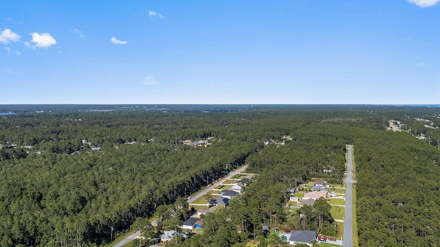 7045 Leisure St, Navarre, FL 32566 - view of property location featuring a forest and nearby suburban area