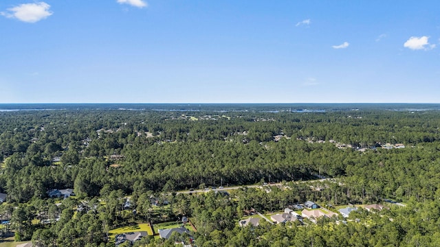 7045 Leisure St, Navarre, FL 32566 - aerial view of property's location featuring a heavily wooded area