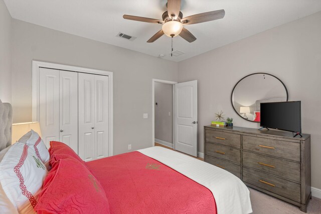 7045 Leisure St, Navarre, FL 32566 - bedroom with baseboards, a closet, and ceiling fan