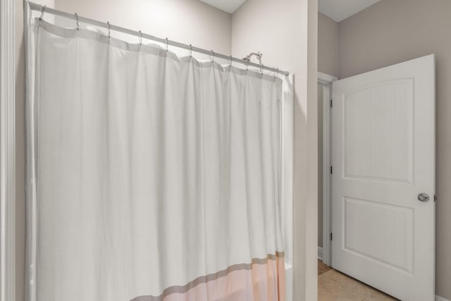 7045 Leisure St, Navarre, FL 32566 - full bathroom with a shower with curtain and tile patterned floors