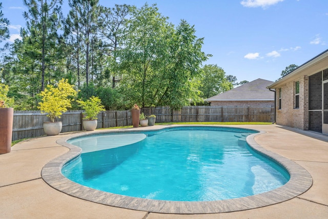 7045 Leisure St, Navarre, FL 32566 - view of pool with a patio and a fenced backyard