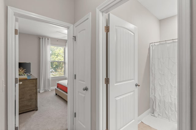 7045 Leisure St, Navarre, FL 32566 - full bathroom with baseboards and curtained shower