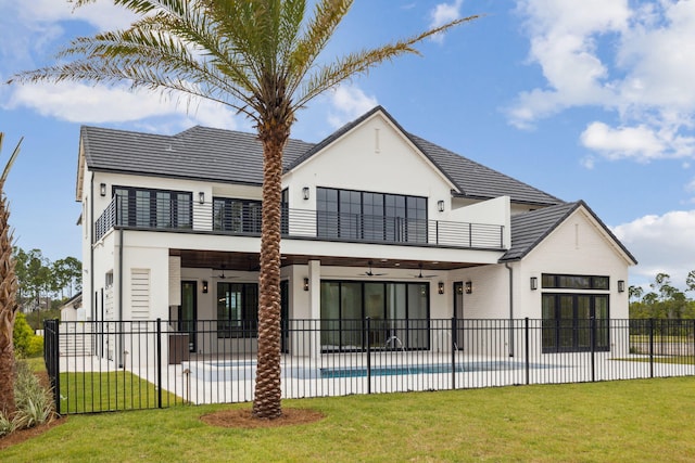 724 Windsong Dr, Inlet Beach, FL 32461 - back of house featuring fence, a patio area, ceiling fan, a balcony, and a yard