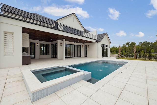 724 Windsong Dr, Inlet Beach, FL 32461 - rear view of house with fence, a ceiling fan, a balcony, a patio, and stucco siding