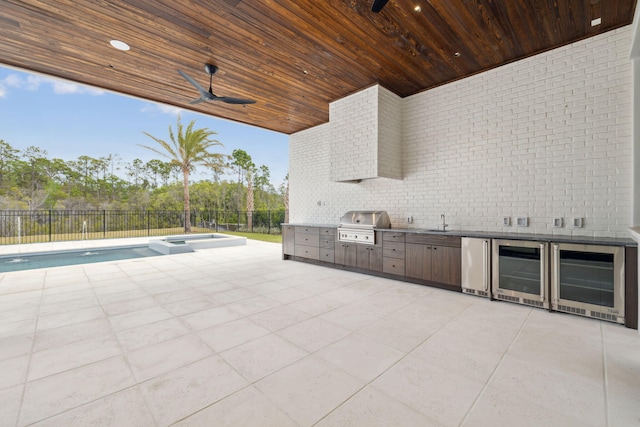 724 Windsong Dr, Inlet Beach, FL 32461 - view of patio with a grill, fence, wine cooler, and exterior kitchen