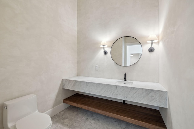 724 Windsong Dr, Inlet Beach, FL 32461 - half bathroom with vanity, toilet, and baseboards