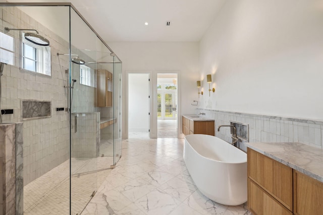 724 Windsong Dr, Inlet Beach, FL 32461 - bathroom with plenty of natural light, a freestanding tub, and a shower stall