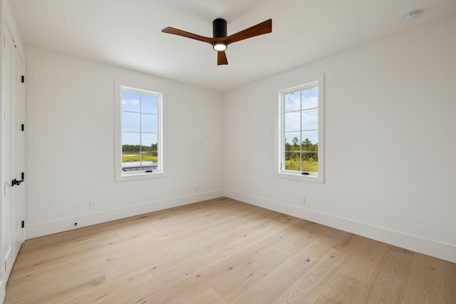 724 Windsong Dr, Inlet Beach, FL 32461 - unfurnished room featuring baseboards, a ceiling fan, and light wood-style floors