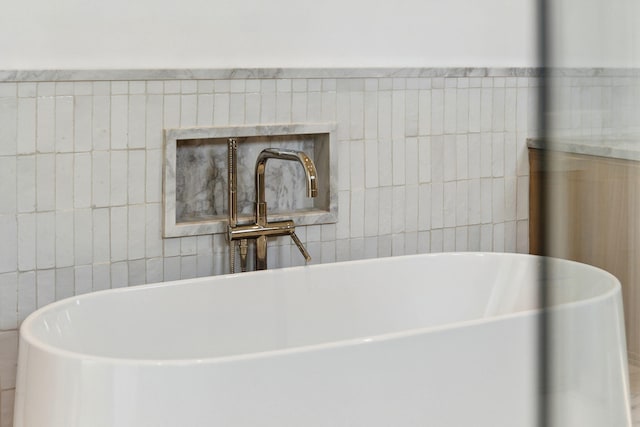 724 Windsong Dr, Inlet Beach, FL 32461 - full bath with tile walls, a sink, and a freestanding bath