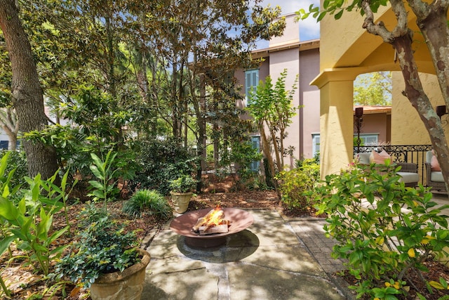 30 Place De La Fontaine, Miramar Beach, FL 32550 - view of patio / terrace featuring an outdoor fire pit