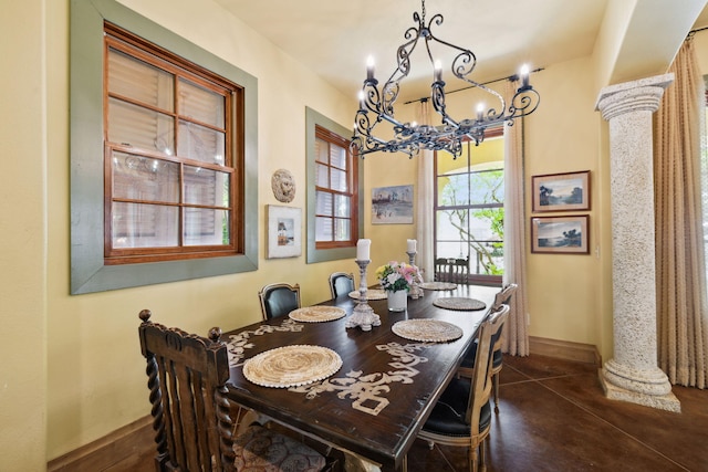 30 Place De La Fontaine, Miramar Beach, FL 32550 - dining area with baseboards, an inviting chandelier, and finished concrete flooring