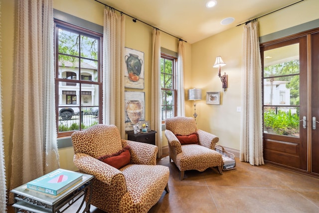 30 Place De La Fontaine, Miramar Beach, FL 32550 - living area with baseboards and tile patterned floors