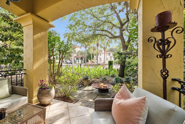 30 Place De La Fontaine, Miramar Beach, FL 32550 - balcony featuring a fire pit and a patio area
