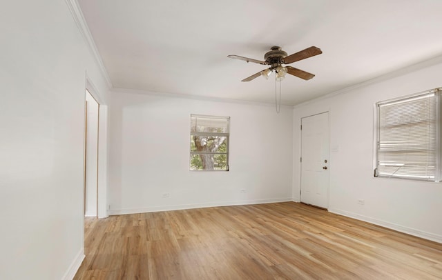 12372 W US Highway 90, Defuniak Springs, FL 32433 - unfurnished room with crown molding, light wood-style floors, ceiling fan, and baseboards