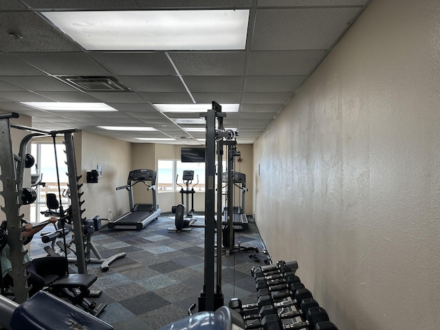 16819 Front Beach Rd Unit 1110, Panama City Beach, FL 32413 - gym with a drop ceiling, baseboards, and visible vents
