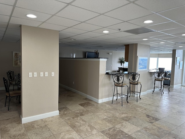16819 Front Beach Rd Unit 1110, Panama City Beach, FL 32413 - kitchen featuring baseboards, a kitchen breakfast bar, and recessed lighting