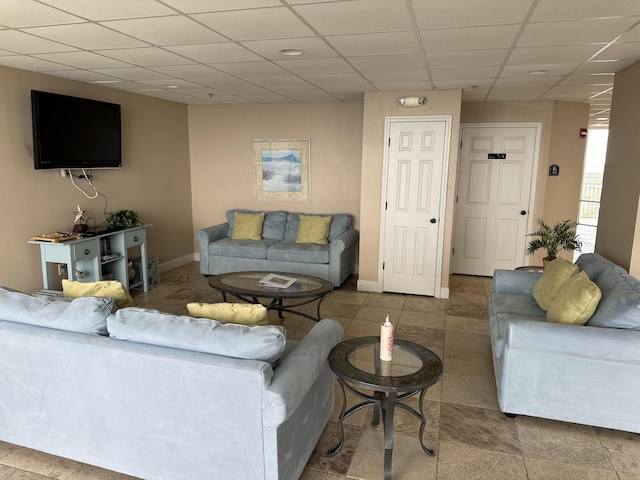 16819 Front Beach Rd Unit 1110, Panama City Beach, FL 32413 - tiled living area featuring a paneled ceiling and baseboards