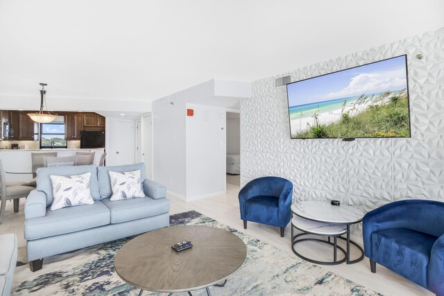 4260 Beachside Two Unit 4260, Miramar Beach, FL 32550 - living area featuring light wood-type flooring and baseboards