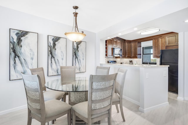 4260 Beachside Two Unit 4260, Miramar Beach, FL 32550 - dining area with baseboards, recessed lighting, and light wood finished floors