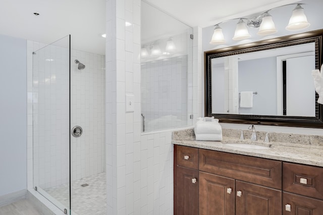 4260 Beachside Two Unit 4260, Miramar Beach, FL 32550 - full bathroom with a walk in shower, vanity, and decorative columns