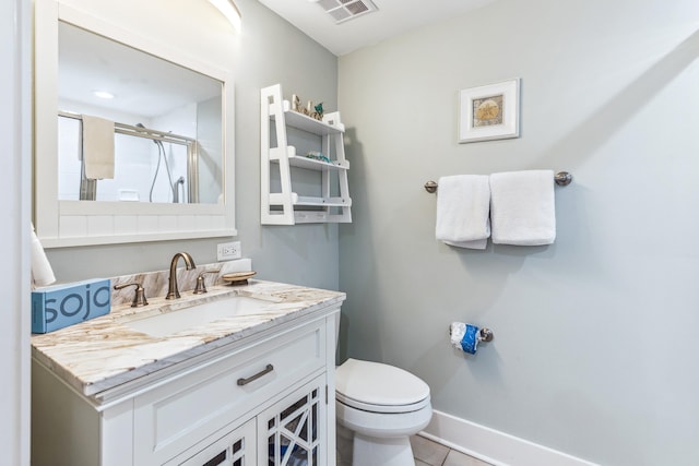 9200 Baytowne Wharf Blvd Unit 441, Miramar Beach, FL 32550 - bathroom with a shower stall, toilet, vanity, baseboards, and tile patterned flooring
